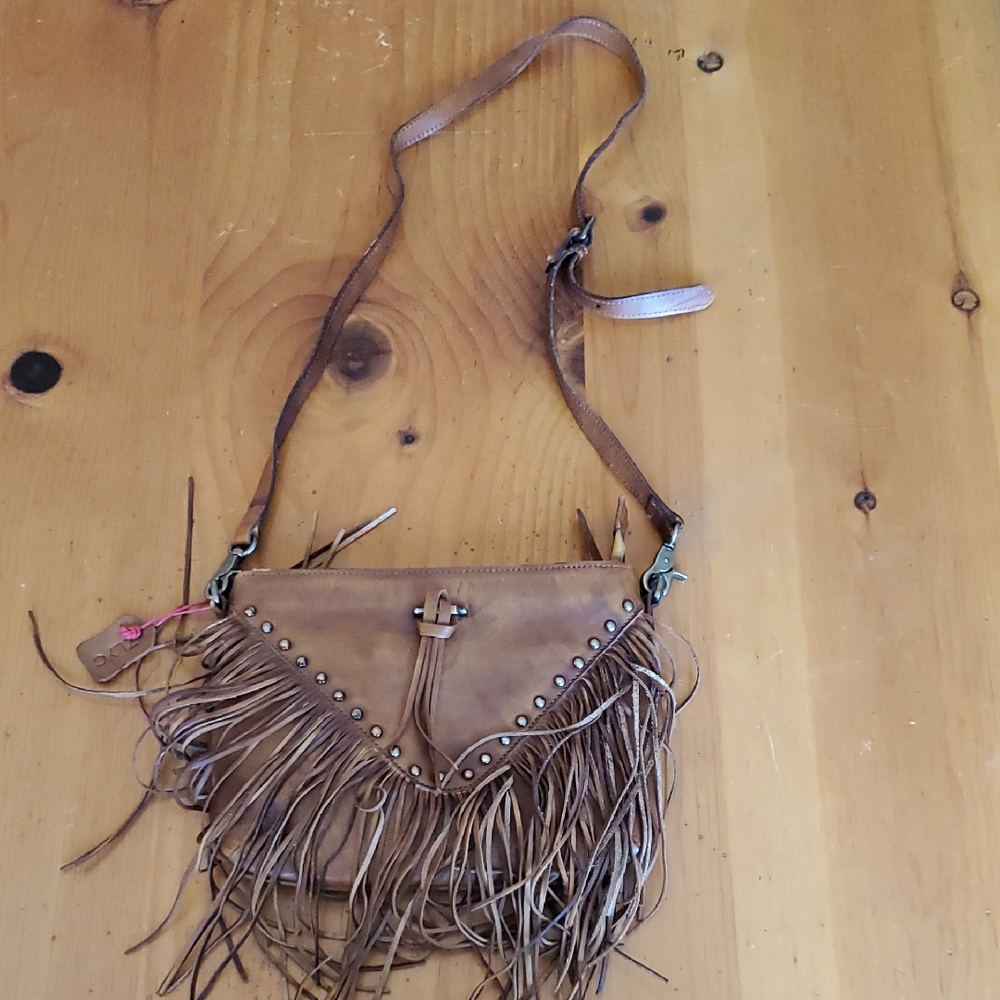 ZLYC Leather Bohemian Crossbody Bag With Tassels
